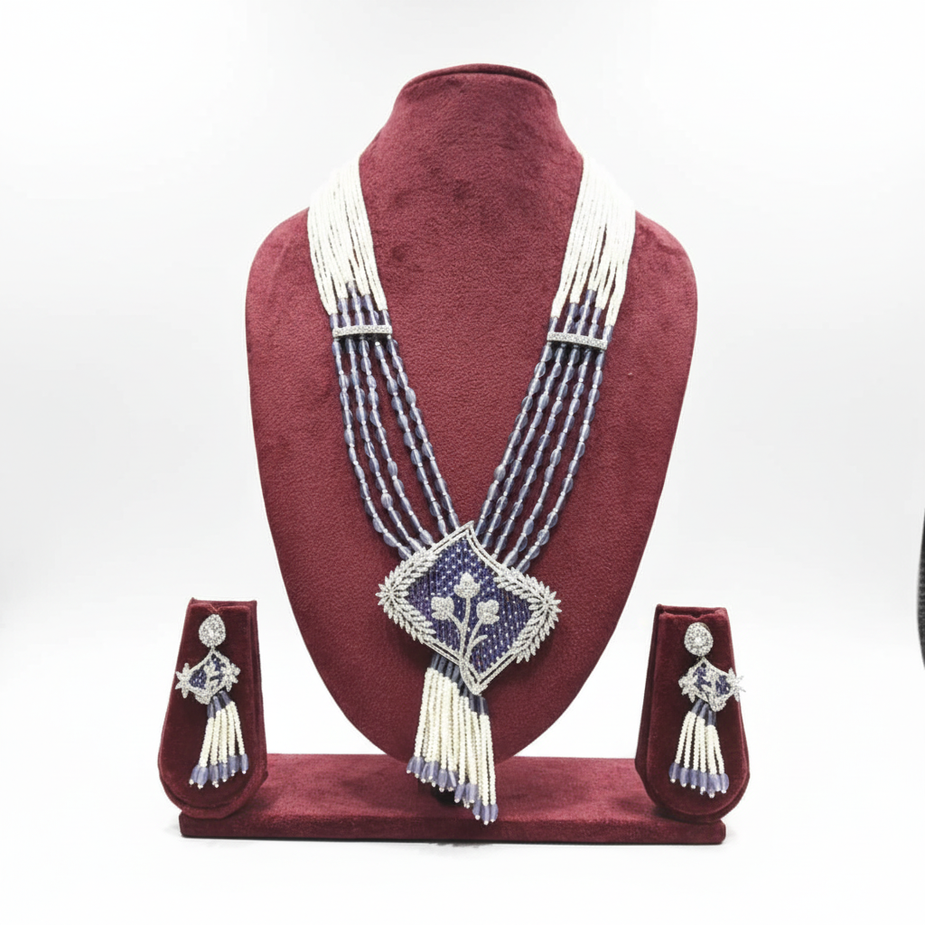 Pearl and sapphire bead AD kite pendant pearl tassel long necklace set on burgundy velvet display