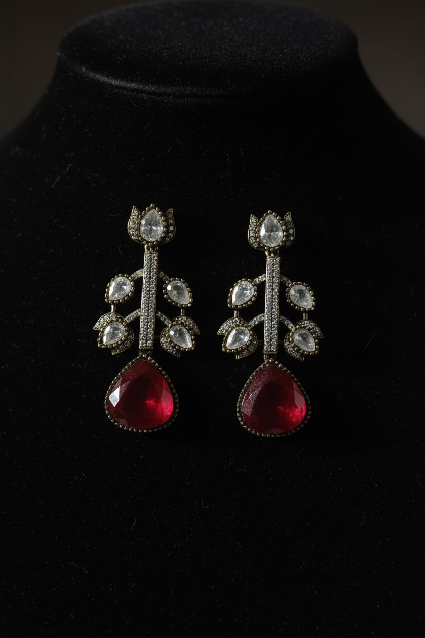 Polki Botanical Vine Ruby Drop Earrings – dark velvet luxury editorial promotional image