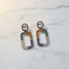 Rainbow CZ Open Rectangle Earrings – luxury flat lay on marble