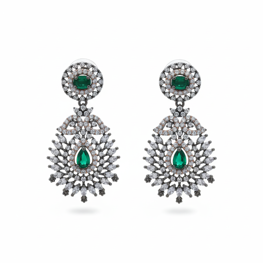 Emerald chandelier drop earrings on white background studio shot