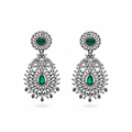 Emerald chandelier drop earrings on white background studio shot