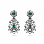 Emerald chandelier drop earrings on white background studio shot