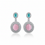 Pink cat's eye double halo drop earrings on white background studio shot