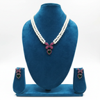 Double-strand pearl and ruby pink AD butterfly bow emerald heart pendant necklace set on navy velvet display