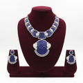 Sapphire blue and white AD art deco panel choker necklace set on burgundy velvet display