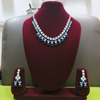 Sapphire blue AD double-row fringe necklace set on burgundy velvet display