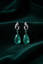 Emerald Wave Teardrop Drop Earrings – dark velvet luxury editorial promotional image