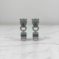 Rainbow CZ Barrel Jhumka Earrings – luxury flat lay on marble