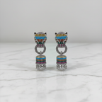 Rainbow CZ Barrel Jhumka Earrings – luxury flat lay on marble