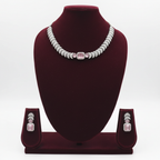 Rose pink AD pave disc necklace set on burgundy velvet display