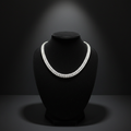 White AD double-row tennis necklace on dark velvet studio display