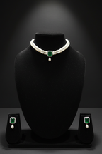 Seed pearl choker with emerald square AD pendant on dark velvet studio display