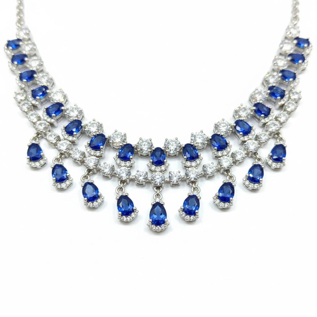 Close-up macro of sapphire ovals, AD clusters and teardrop fringe drops