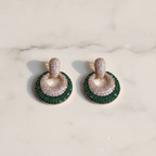 Emerald Green CZ Open Circle Earrings – luxury flat lay on marble