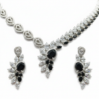 Close-up macro of leaf motif and black onyx centre stone