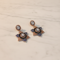 Navy Blue Amber Black Enamel Lotus Earrings – luxury flat lay on marble
